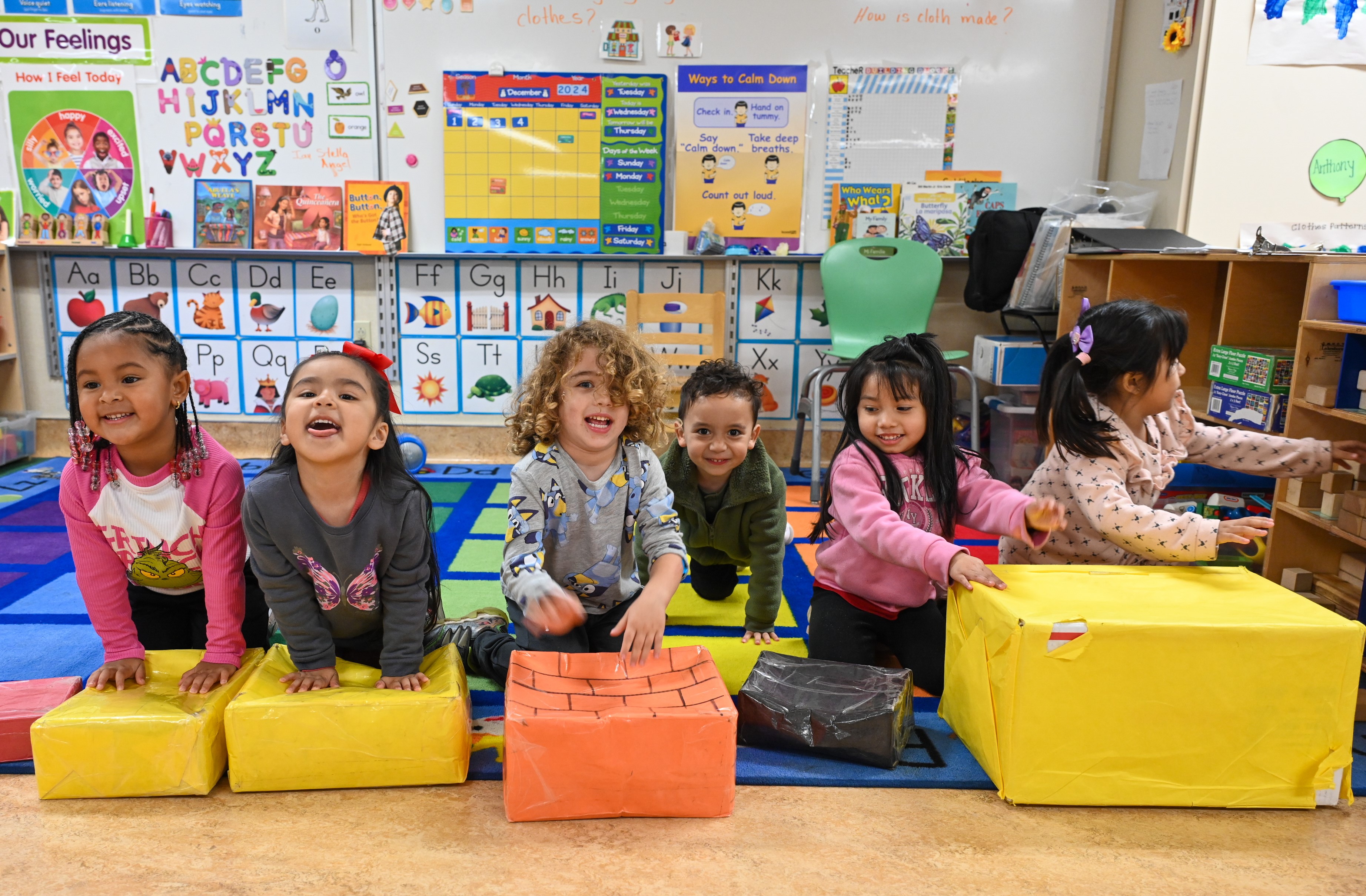 Children playing with blocks in preschool classroom