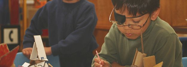 child with eye patch